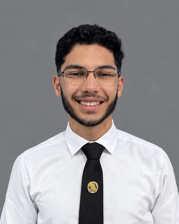 Saulo Storel in a white shirt and black tie